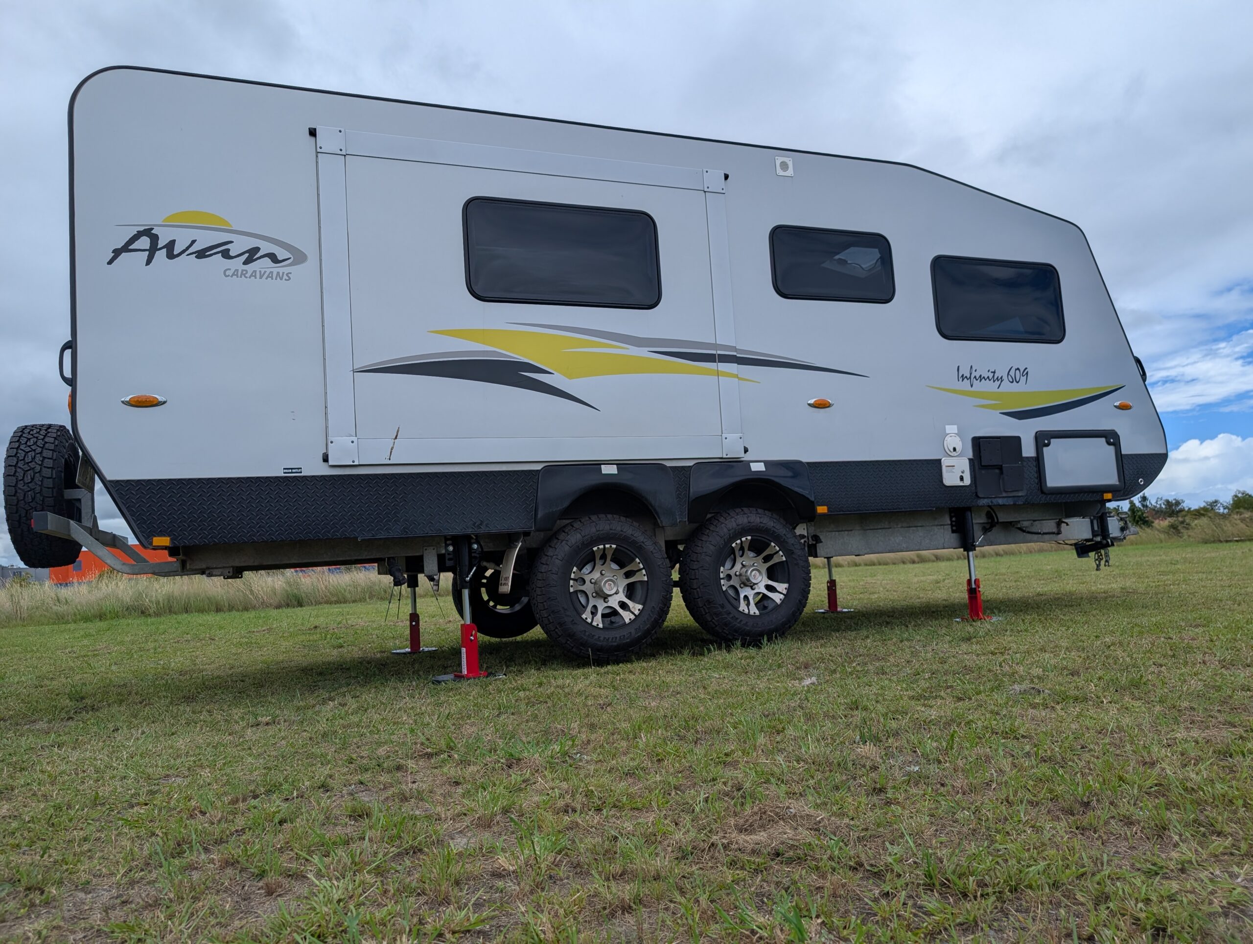 Caravan being lifted by the Redfoot Levelling flip leg system