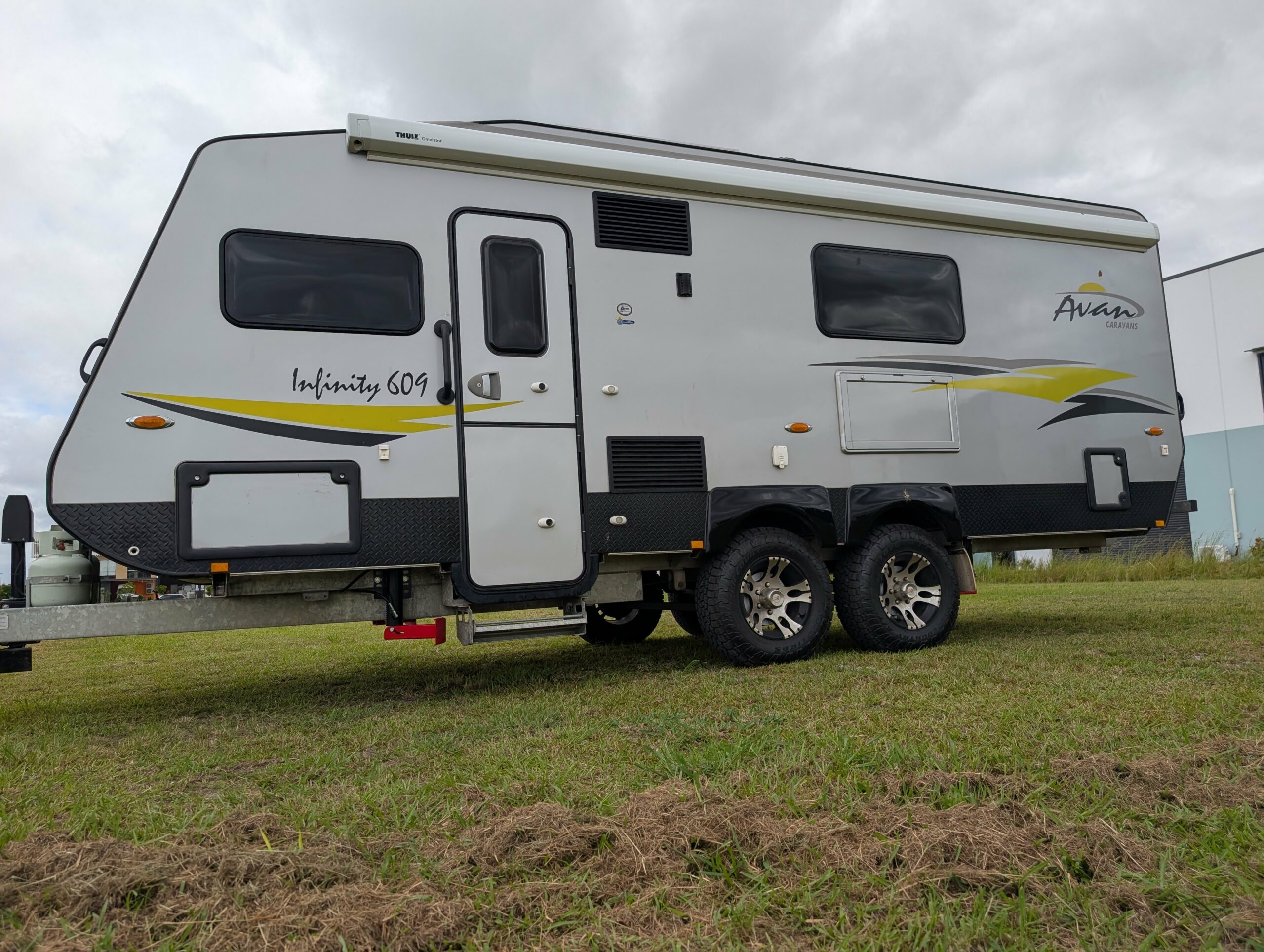 Side photo of Redfoot flip legs retracted on caravan