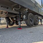 Caravan being levelled by AutoLift system