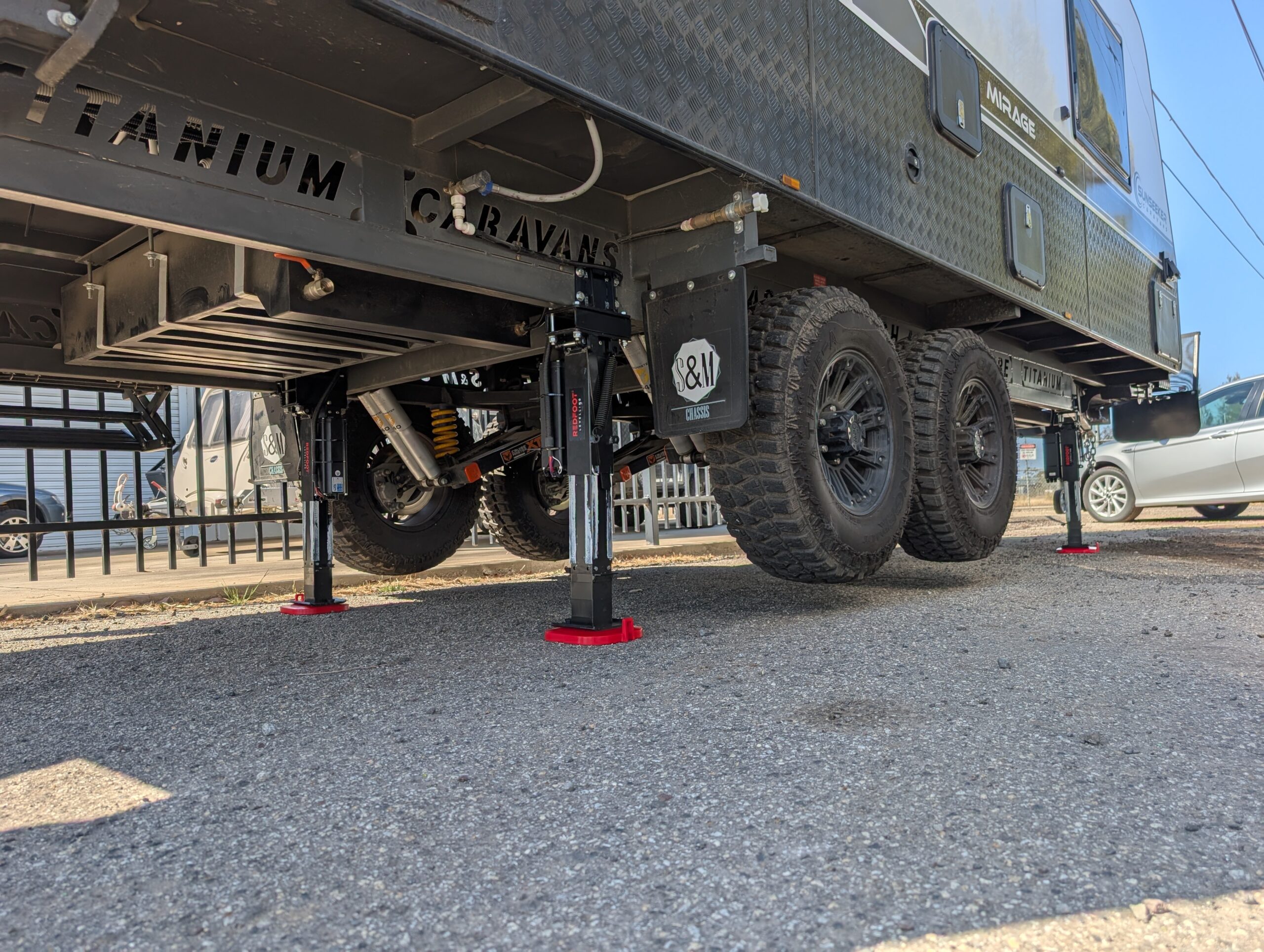 Caravan being levelled by AutoLift system