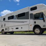 Side shot of Isuzu NQR levelled up